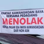 Baliho Tolak Kepala Pasar Non ASN Muncul di Pasar Esa Waya Kawangkoan